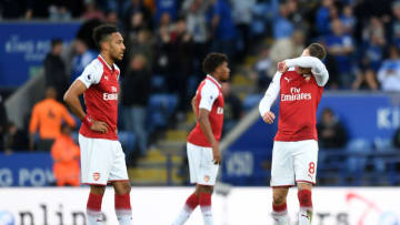 LEICESTER, ENGLAND - MAY 09: Pierre-Emerick Aubameyang of Arsenal and Aaron Ramsey of Arsenal look dejected after Leicester City score during the Premier League match between Leicester City and Arsenal at The King Power Stadium on May 9, 2018 in Leicester, England. (Photo by Michael Regan/Getty Images)