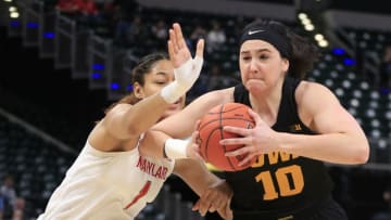INDIANAPOLIS, INDIANA - MARCH 10: Megan Gustafson #10 of the Iowa Hawkeyes drives to the basket while being guarded by Shakira Austin #1 of the Maryland Terrapins during the first half of the Big 10 Women's Championship Game at Bankers Life Fieldhouse on March 10, 2019 in Indianapolis, Indiana. (Photo by Justin Casterline/Getty Images)