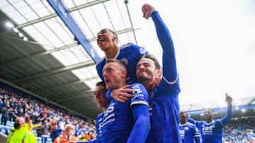 LEICESTER, ENGLAND - MAY 23: Jamie Vardy of Leicester City celebrates with teammates Luke Thomas, James Maddison and Youri Tielemans in front of the Leicester City fans after scoring his team's second goal during the Premier League match between Leicester City and Tottenham Hotspur at The King Power Stadium on May 23, 2021 in Leicester, England. A limited number of fans will be allowed into Premier League stadiums as Coronavirus restrictions begin to ease in the UK. (Photo by Laurence Griffiths/Getty Images)