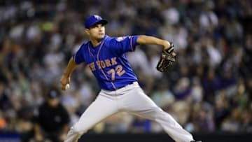 Aug 22, 2015; Denver, CO, USA; New York Mets relief pitcher Carlos Torres (72) delivers a pitch in the eighth inning against the Colorado Rockies at Coors Field. The Mets defeated the Rockies 14-9. Mandatory Credit: Ron Chenoy-USA TODAY Sports
