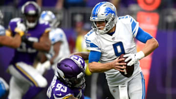 MINNEAPOLIS, MN - NOVEMBER 4: Matthew Stafford #9 of the Detroit Lions scrambles with the ball while being pursued by Sheldon Richardson #93 of the Minnesota Vikings in the first half of the game at U.S. Bank Stadium on November 4, 2018 in Minneapolis, Minnesota. (Photo by Hannah Foslien/Getty Images)