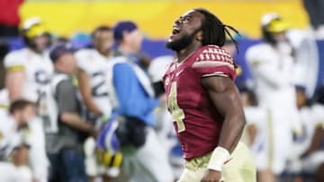 MIAMI GARDENS, FL - DECEMBER 30: MVP Dalvin Cook