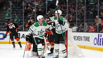 Mar 29, 2022; Anaheim, California, USA; Dallas Stars center Radek Faksa (12) and center Luke Glendening (11) celebrate after a goal against the Anaheim Ducks in the first period at Honda Center. Mandatory Credit: Kirby Lee-USA TODAY Sports