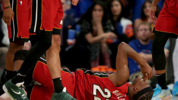 Apr 30, 2023; New York, New York, USA; Miami Heat forward Jimmy Butler (22) reacts after landing awkwardly on his left foot after a collision with New York Knicks guard Josh Hart (not pictured) during the fourth quarter of game one of the 2023 NBA Eastern Conference semifinal playoffs at Madison Square Garden. Mandatory Credit: Brad Penner-USA TODAY Sports
