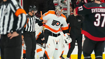 Dec 23, 2022; Raleigh, North Carolina, USA; Philadelphia Flyers goaltender Carter Hart (79) leaves the ice after being injured during the second period against the Carolina Hurricanes at PNC Arena. Mandatory Credit: James Guillory-USA TODAY Sports