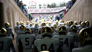 PALO ALTO, CALIFORNIA - NOVEMBER 30: The Notre Dame Fighting Irish wait to run on to the field for their game against the Stanford Cardinal at Stanford Stadium on November 30, 2019 in Palo Alto, California. (Photo by Ezra Shaw/Getty Images)