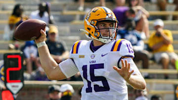 Oct 10, 2020; Columbia, Missouri, USA; LSU Tigers quarterback Myles Brennan (15) throws a pass against the Missouri Tigers during the first half at Faurot Field at Memorial Stadium. Mandatory Credit: Jay Biggerstaff-USA TODAY Sports