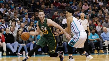 Jan 18, 2016; Charlotte, NC, USA; Utah Jazz forward Gordon Hayward (20) drives the ball around Charlotte Hornets guard Jeremy Lin (7) in the second half at Time Warner Cable Arena. The Hornets defeated the Jazz in two overtimes 124-119. Mandatory Credit: Jeremy Brevard-USA TODAY Sports