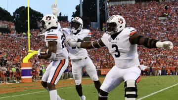 Marlon Davidson (3), Jeremiah Dinson (20) and Javaris Davis are part of one of the nation's top returning defenses in 2018. (Photo by Mike Comer/Getty Images)