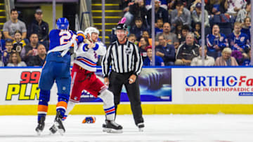 BRIDGEPORT, CT - SEPTEMBER 22: New York Islanders Defenseman Scott Mayfield #24 and New York Rangers Winger Cody McLeod #8 go toe to toe during the first period of a preseason NHL game between the New York Rangers and the New York Islanders on September 22, 2018, at Webster Bank Arena in Bridgeport, CT. (Photo by David Hahn/Icon Sportswire via Getty Images)