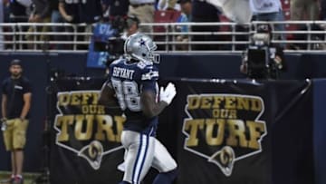 Sep 21, 2014; St. Louis, MO, USA; Dallas Cowboys wide receiver Dez Bryant (88) scores a touchdown against the St. Louis Rams during the second half at the Edward Jones Dome. Mandatory Credit: Jasen Vinlove-USA TODAY Sports