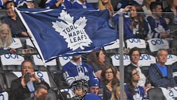 TORONTO,ON - APRIL 23: The flag skater performs prior to action between the Washington Capitals and the Toronto Maple Leafs in Game Six of the Eastern Conference Quarterfinals during the 2017 NHL Stanley Cup Playoffs at the Air Canada Centre on April 23, 2017 in Toronto, Ontario, Canada. The Capitals defeated the Maple Leafs 2-1 in overtime to win series 4-2. (Photo by Claus Andersen/Getty Images)