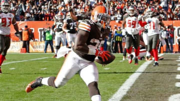 Nov 2, 2014; Cleveland, OH, USA; Cleveland Browns running back Terrance West (28) scores a touchdown against the Tampa Bay Buccaneers during the third quarter at FirstEnergy Stadium. The Browns won 22-17. Mandatory Credit: Ron Schwane-USA TODAY Sports