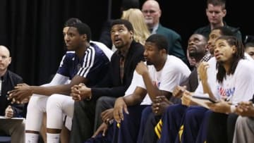 Feb 7, 2014; Indianapolis, IN, USA; Indiana Pacers center Andrew Bynum watches from the in dress clothes during a game against the Portland Trail Blazers at Bankers Life Fieldhouse. Indiana defeats Portland 118-113 in overtime. Mandatory Credit: Brian Spurlock-USA TODAY Sports