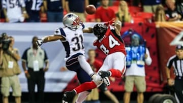 Sep 29, 2013; Atlanta, GA, USA; New England Patriots cornerback Aqib Talib (31) breaks up a pass in the end zone intended for Atlanta Falcons wide receiver Roddy White (84) in the final seconds in the fourth quarter at the Georgia Dome. The Patriots won 30-23. Mandatory Credit: Daniel Shirey-USA TODAY Sports