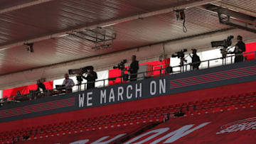 SOUTHAMPTON, ENGLAND - JULY 05: TV Camera Operators film from the gantry during the Premier League match between Southampton FC and Manchester City at St Mary's Stadium on July 05, 2020 in Southampton, England. Football Stadiums around Europe remain empty due to the Coronavirus Pandemic as Government social distancing laws prohibit fans inside venues resulting in games being played behind closed doors. (Photo by Catherine Ivill/Getty Images)