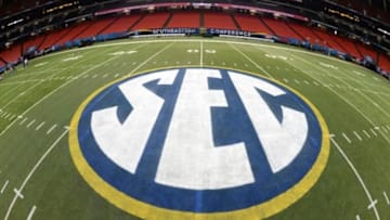 Dec 5, 2014; Atlanta, GA, USA; The Southeastern Conference logo is seen at midfield at the Georgia Dome. The Alabama Crimson Tide plays the Missouri Tigers in the SEC Championship on Saturday. Mandatory Credit: John David Mercer-USA TODAY Sports