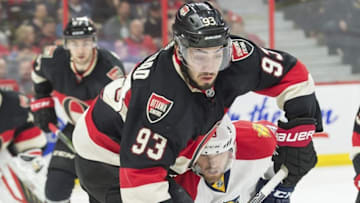 Apr 7, 2016; Ottawa, Ontario, CAN; Ottawa Senators center Mika Zibanejad (93) battles with Florida Panthers center Rocco Grimaldi (23) in the first period at the Canadian Tire Centre. Mandatory Credit: Marc DesRosiers-USA TODAY Sports