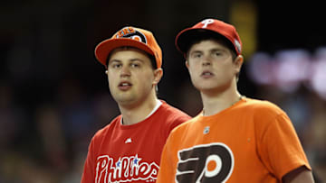 PHOENIX, AZ - APRIL 26: Fans of the Philadelphia Phillies and the Philadelphia Flyers watch the Major League Baseball game against the Arizona Diamondbacks at Chase Field on April 26, 2011 in Phoenix, Arizona. The Diamondbacks defeated the Phillies 7-5. (Photo by Christian Petersen/Getty Images)