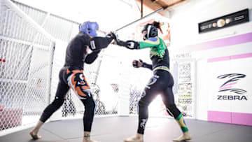 Cris Cyborg and Valentina Shevchenko training ahead of their UFC 231 and UFC 232 fights this December - Photos by Amy Kaplan/Fansided