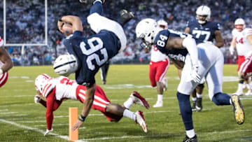 UNIVERSITY PARK, PA - NOVEMBER 18: Saquon Barkley #26 of the Penn State Nittany Lions flips over Dicaprio Bootle #23 of the Nebraska Cornhuskers in what was originally ruled a touchdown then reviewed and pulled back to the 1 yard line during the first quarter on November 18, 2017 at Beaver Stadium in University Park, Pennsylvania. (Photo by Brett Carlsen/Getty Images)