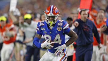 MIAMI GARDENS, FL - DECEMBER 30: Kyle Pitts #84 of the Florida Gators runs with the ball against the Virginia Cavaliers at the Capital One Orange Bowl at Hard Rock Stadium on December 30, 2019 in Miami Gardens, Florida. Florida defeated Virginia 36-28. (Photo by Joel Auerbach/Getty Images)