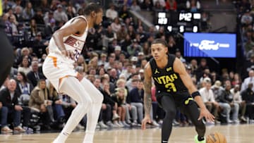 Nov 19, 2023; Salt Lake City, Utah, USA; Utah Jazz guard Keyonte George (3) dribbles against Phoenix Suns forward Kevin Durant (35) during the second half at Delta Center. Mandatory Credit: Chris Nicoll-USA TODAY Sports