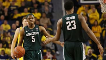 ANN ARBOR, MICHIGAN - FEBRUARY 24: Cassius Winston #5 of the Michigan State Spartans celebrates a second half play with Xavier Tillman #23 while playing the Michigan Wolverines at Crisler Arena on February 24, 2019 in Ann Arbor, Michigan. Michigan State won the game 77-70. (Photo by Gregory Shamus/Getty Images)