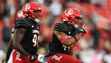 Louisville's Dorian Jones gestures to shush the Eagles of Boston College. Syndication: The Courier-Journal