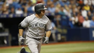 Jul 31, 2016; St. Petersburg, FL, USA; New York Yankees left fielder Brett Gardner (11) singles during the seventh inning against the Tampa Bay Rays at Tropicana Field. Mandatory Credit: Kim Klement-USA TODAY Sports
