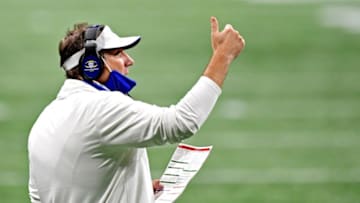 Dec 19, 2020; Atlanta, Georgia, USA; Florida Gators head coach Dan Mullen signals from the sideline during the fourth quarter against the Alabama Crimson Tide in the SEC Championship at Mercedes-Benz Stadium. Mandatory Credit: Adam Hagy-USA TODAY Sports