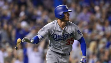 DENVER, CO - AUGUST 9: Cody Bellinger #35 of the Los Angeles Dodgers hits a two-run home run in the seventh inning against the Colorado Rockies at Coors Field on August 9, 2018 in Denver, Colorado. (Photo by Dustin Bradford/Getty Images)