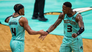 Terry Rozier #3 of congratulates Devonte' Graham #4 of the Charlotte Hornets (Photo by Jacob Kupferman/Getty Images)