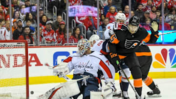 WASHINGTON, DC - MARCH 24: Washington Capitals goaltender Braden Holtby (70) makes a second period save on shot by Philadelphia Flyers left wing James van Riemsdyk (25) on March 24, 2019, at the Capital One Arena in Washington, D.C. (Photo by Mark Goldman/Icon Sportswire via Getty Images)