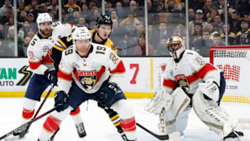 BOSTON, MA - MARCH 07: Boston Bruins left wing Danton Heinan (43) gets sandwiched by Florida Panthers defenseman Aaron Ekblad (5) and Florida Panthers defenseman Mike Matheson (19) in front of Florida Panthers goalie Roberto Luongo (1) during a game between the Boston Bruins and the Florida Panthers on March 7, 2019, at TD Garden in Boston, Massachusetts. (Photo by Fred Kfoury III/Icon Sportswire via Getty Images)