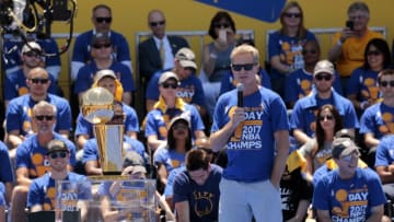 OAKLAND, CA - JUNE 15: Steve Kerr of the Golden State Warriors celebrates winning the 2017 NBA Championship during a parade on June 15, 2017 in Oakland, CA. NOTE TO USER: User expressly acknowledges and agrees that, by downloading and/or using this Photograph, user is consenting to the terms and conditions of the Getty Images License Agreement. Mandatory Copyright Notice: Copyright 2017 NBAE (Photo by Jack Arent/NBAE via Getty Images)