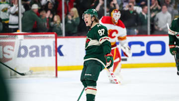 Kirill Kaprizov celebrates his game-winning goal in overtime off a Kevin Fiala assist on Thursday night against Calgary. MInnesota closes out the regular season against Colorado.David Berding-USA TODAY Sports