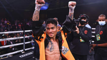 ATLANTIC CITY, NJ - JANUARY 22: Mark Magsayo reacts after fighting Gary Russell Jr. for the WBC World Featherweight Championship at the Borgata Hotel Casino & Spa on January 22, 2022 in Atlantic City, United States. (Photo by Mitchell Leff/Getty Images)