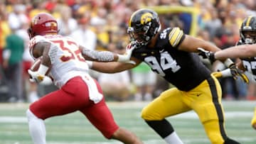 IOWA CITY, IOWA- SEPTEMBER 08: Defensive end A.J. Epenesa #94 of the Iowa Hawkeyes gives chase to runningback David Montgomery #32 of the Iowa State Cyclones during the first half on September 8, 2018 at Kinnick Stadium, in Iowa City, Iowa. (Photo by Matthew Holst/Getty Images)