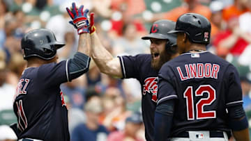 Jun 26, 2016; Detroit, MI, USA; Cleveland Indians designated hitter Mike Napoli (26) receives congratulations from shortstop Francisco Lindor (12) and Jose Ramirez (11) after he hits a two-run home run in the fifth inning against the Detroit Tigers at Comerica Park. Mandatory Credit: Rick Osentoski-USA TODAY Sports
