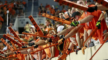 STILLWATER, OK - AUGUST 30: Oklahoma State Cowboys fans paddle the wall during the game against the Missouri State Bears at Boone Pickens Stadium on August 30, 2018 in Stillwater, Oklahoma. The Cowboys defeated the Bears 58-17. (Photo by Brett Deering/Getty Images)