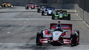 DETROIT, MI - JUNE 01: Juan Pablo Montoya of Colombia, driver of the #2 Penske Motorsports Dallara Chevrolet, leads a pack of cars during the Verizon IndyCar Series Chevrolet Indy Dual in Detroit Dual II race at Belle Isle Park on June 1, 2014 in Detroit, Michigan. (Photo by Robert Laberge/Getty Images)