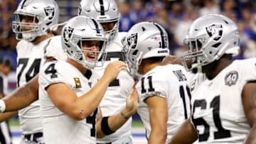 INDIANAPOLIS, INDIANA - SEPTEMBER 29: Derek Carr #4 and Trevor Davis #11 of the Oakland Raiders celebrate a touchdown during the first quarter during game against the Indianapolis Colts at Lucas Oil Stadium on September 29, 2019 in Indianapolis, Indiana. (Photo by Justin Casterline/Getty Images)