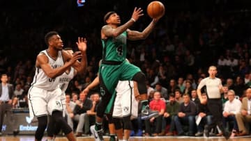 Jan 4, 2016; Brooklyn, NY, USA; Boston Celtics guard Isaiah Thomas (4) drives up to the net past Brooklyn Nets forward Thaddeus Young (30) during the third quarter at Barclays Center. Boston Celtics won 103-94. Mandatory Credit: Anthony Gruppuso-USA TODAY Sports