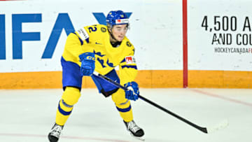 HALIFAX, CANADA - DECEMBER 31: Noah Ostlund #12 of Team Sweden skates against Team Canada during the first period in the 2023 IIHF World Junior Championship at Scotiabank Centre on December 31, 2022 in Halifax, Nova Scotia, Canada. Team Canada defeated Team Sweden 5-1. (Photo by Minas Panagiotakis/Getty Images)