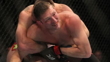 LAS VEGAS, NV - MAY 26: Jason Miller grapples with CB Dollaway in their middleweight bout during UFC 146 at the MGM Grand Garden Arena on May 26, 2012 in Las Vegas, Nevada. (Photo by Josh Hedges/Zuffa LLC/Zuffa LLC via Getty Images)