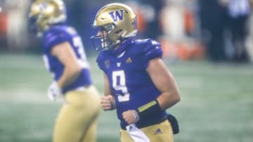 Nov 14, 2020; Seattle, Washington, USA; Washington Huskies quarterback Dylan Morris (9) celebrates after rushing for a touchdown against the Oregon State Beavers during the second quarter at Alaska Airlines Field at Husky Stadium. Mandatory Credit: Joe Nicholson-USA TODAY Sports