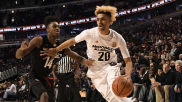 CHICAGO, IL - MARCH 29: Brian "Tugs" Bowen II #20 of the boys west team is defended by Lonnie Walker IV #14 of the boys east team during the 2017 McDonalds's All American Game on March 29, 2017 at the United Center in Chicago, Illinois. (Photo by David Banks/Getty Images)