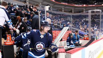 WINNIPEG, MB - FEBRUARY 20: Nic Petan #19 of the Winnipeg Jets hits the ice for the pre-game warm up prior to NHL action against the Los Angeles Kings at the Bell MTS Place on February 20, 2018 in Winnipeg, Manitoba, Canada. (Photo by Darcy Finley/NHLI via Getty Images)