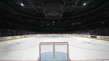 A goal sits on the empty ice (Photo by Patrick Smith/Getty Images)